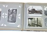 an open book with a picture of a city inside of it