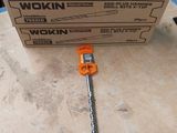 a box of tools sitting on the floor in front of a box