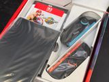 a nintendo wii game in a box with a controller and accessories