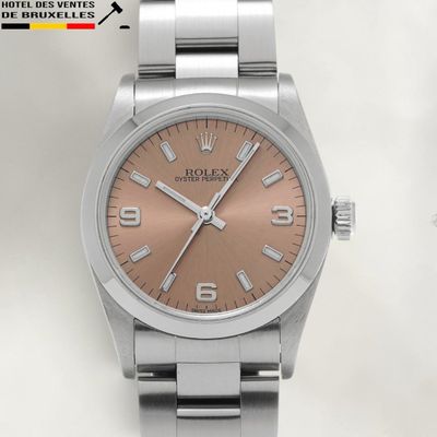 an image of a rolex watch with a pink dial on a steel bracelet