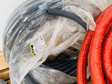 a bunch of hoses that are sitting on top of a box