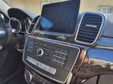 a picture of a car dashboard with a laptop on it