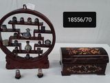 a small wooden box with a mirror on it and a small wooden box with a mirror on it