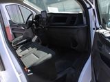 the interior of a white truck with the door open
