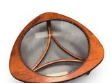 a close up of a wooden plate with a glass top