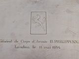 a plaque on the side of a building with a picture of a woman