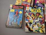 a lot of comic books sitting on a table