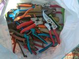 a bag full of pliers and pliers in it