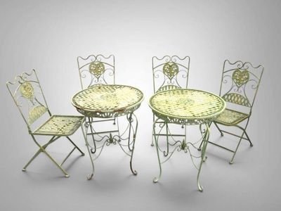 an image of a set of four chairs and a table