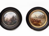 two framed paintings of a river scene with a boat and a man in a boat