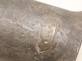 a close up of a metal object with a hole in it