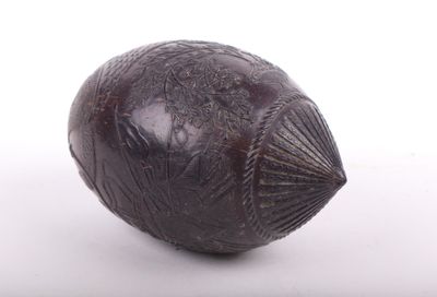 a close up of a fruit on a white surface