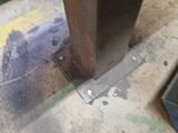 a close up of a piece of metal on the ground