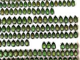 green bugs are lined up in rows on a white surface