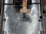 a close up of a machine with a red button
