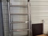many boxes and a ladder in a storage room