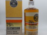 l'image d'une bouteille de whisky posée à côté d'une boîte