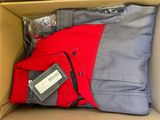 a box with a red jacket and a gray shirt