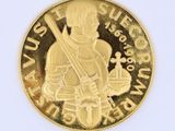 une pièce d'or sur laquelle figure l'image d'un homme tenant une épée