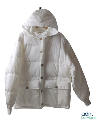 the jacket is white and has a hood that is attached to it