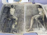 two drawings of a man sitting on a chair next to a drawing of a man sitting on a chair