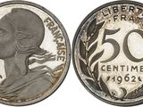 a close up of a coin with a woman ' s face on it