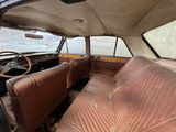 an old car that is sitting in the back of the car