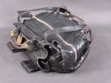 a black purse that is sitting on a table