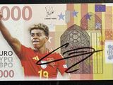 billet d'euro signé, sur lequel figure la photo d'un footballeur