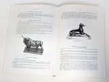 an open book with a picture of a dog and a bull
