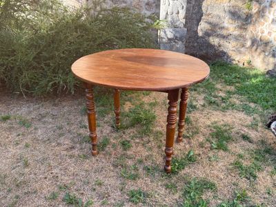 a small table that is sitting in the grass