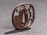 a small metal object that is sitting on a table