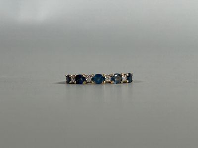 three rings that are sitting in the middle of a body of water