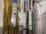 a lot of different types of kitchen utensils in the store
