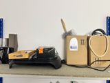 a shelf that has a bunch of items on top of it