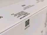 a white box that has a qr code on it