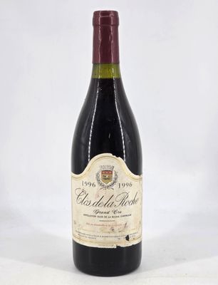 a bottle of wine that is sitting on a table