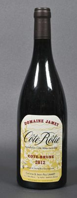 a bottle of wine that is sitting on a table