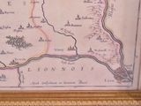 a picture of a picture of a map in a gold frame