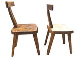 pair of wooden chairs on a white background with a white background