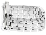 a close up of a wrist watch on a white surface
