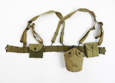 a close up of a belt with two holsters attached to it