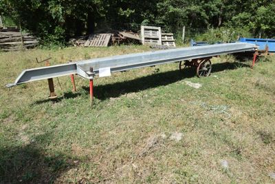 an image of a flatbed trailer parked in a field