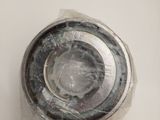 a close up of a ball bearing bearing on a white surface
