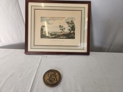 a picture of a picture and a coin on a table