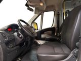 a view of the inside of a van from the driver ' s seat