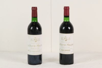 deux bouteilles de vin rouge posées l'une à côté de l'autre sur une table