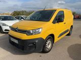 citroen van parked in a parking lot with other cars in the background