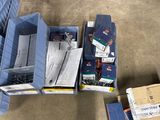 many boxes that are sitting on the floor next to each other