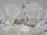 a lot of glass vases that are sitting on a table